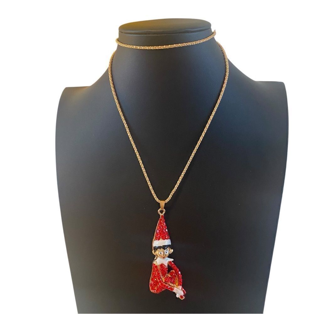 Jeweled Red & Gold Toned Elf Pendant on Long Gold Toned Chain.